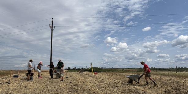 Excavation Team members starting to dig out the trench