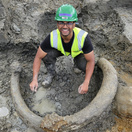 Sahil Ahmed with mammoth remains during fieldwork