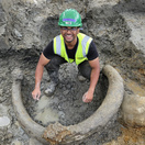 Sahil Ahmed with mammoth remains during fieldwork